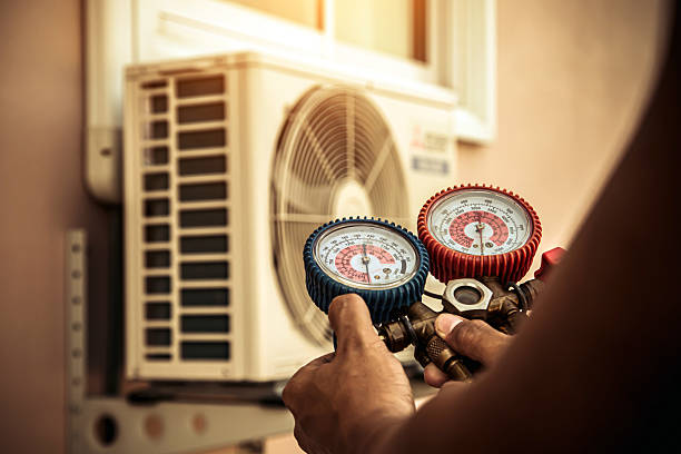 Professional Heat Pump Repair technician working in New Haven, NY